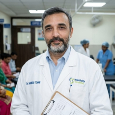 Dr Maneesh Tomar